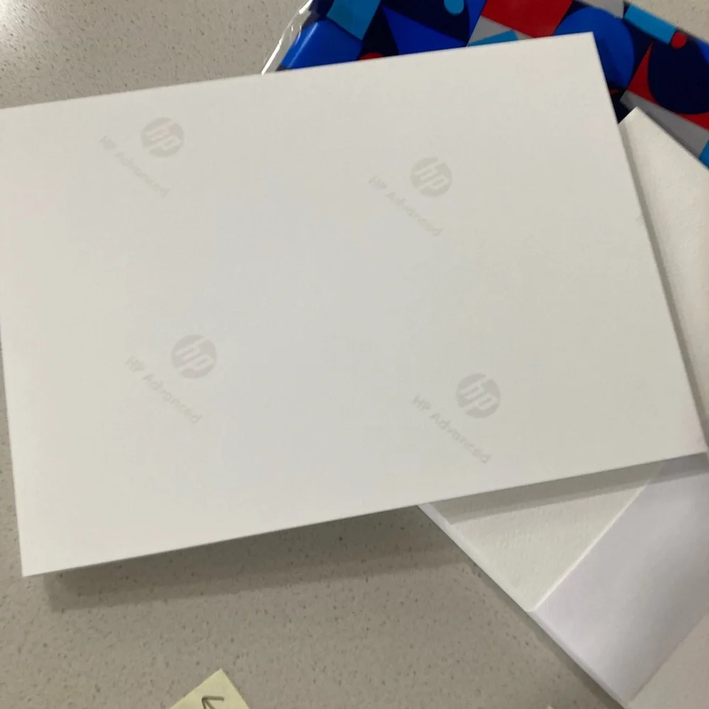 HP product set of photo paper and envelopes